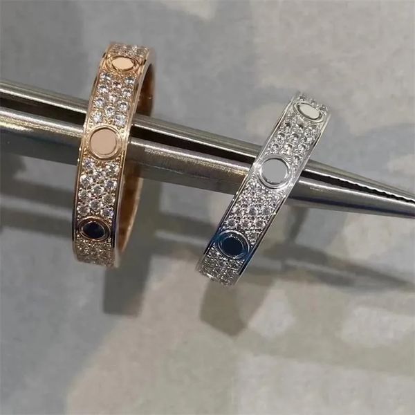 Womens Love Ring  
Mens Designer Heart Ring  
Couple Jewelry Titanium Steel Ring  
Fashion Classic Gold and Silver Rose Diamond Scre  

(Note: Since all provided strings contain fewer than 5 words ...
