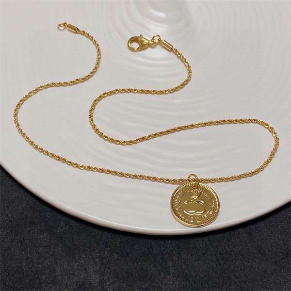 Women's stylish 'C' initial pendant necklace in silver or gold tones, a chic designer choker jewelry piece